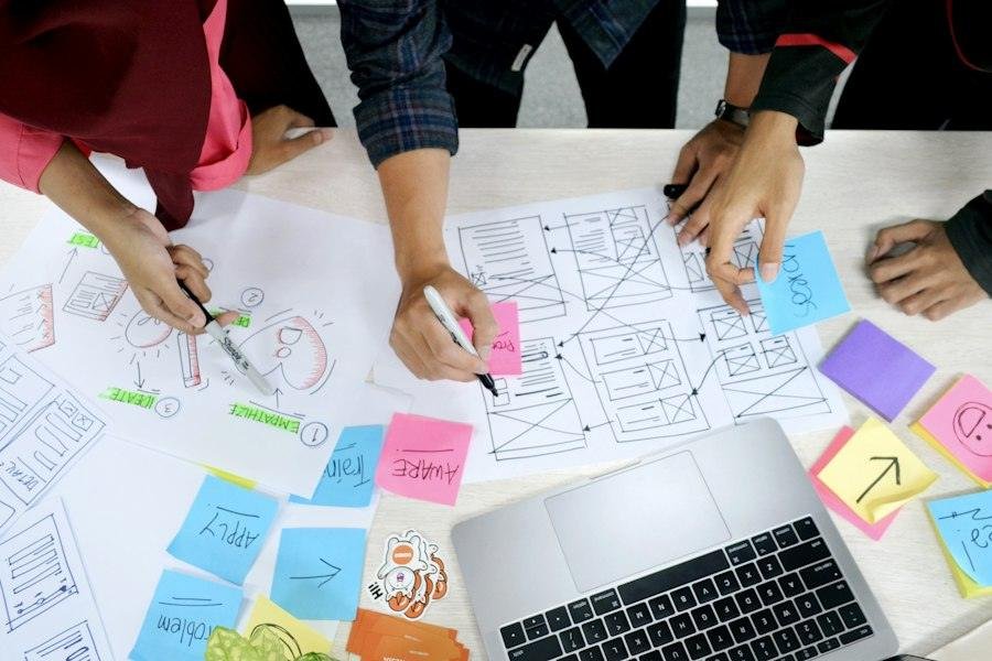 Designers reviewing a website layout